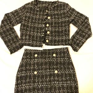 Tweeded jacket & button skirt set.